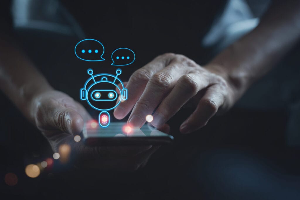 Imagem azul escura de um homem usando o celular, ilustrando um chatbot para empresas em um celular.